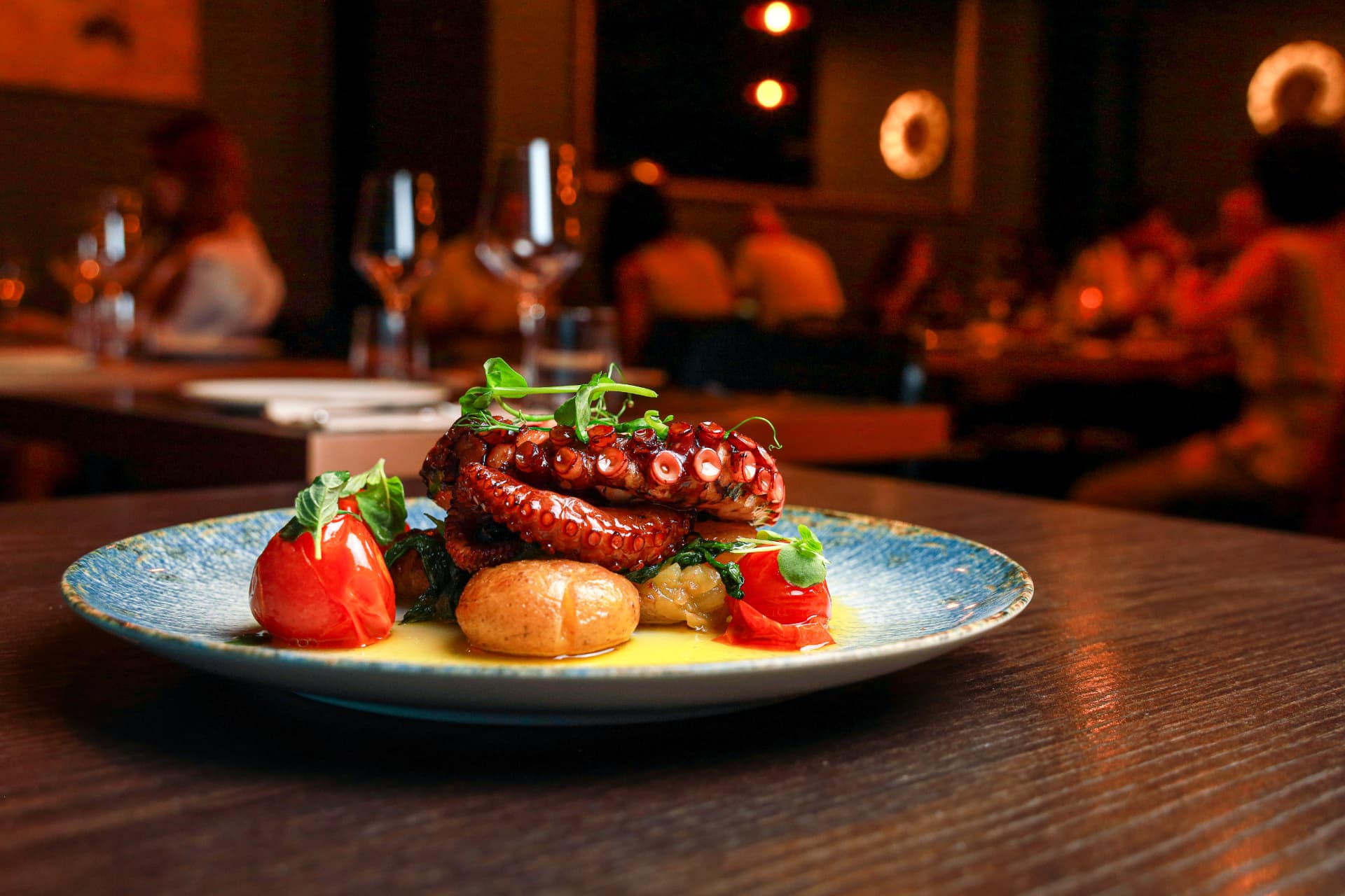 Octopus dish presented in the Enora dining room in Lisbon